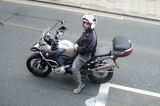 A motorcyclist returns my scrutiny
